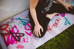 Yoga on painted yoga mat